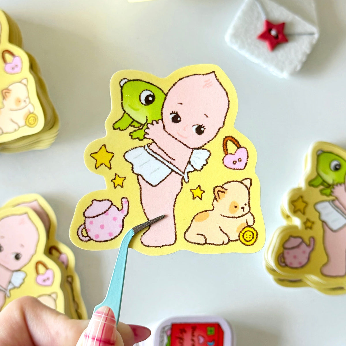 cherub's knick knacks sticker flake